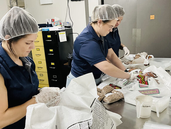 Volunteers making bags
